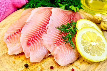 Image showing Fillets tilapia with oil and lemon