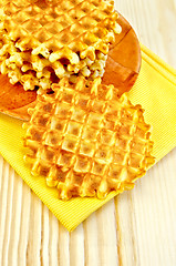 Image showing Waffles circle golden on the board