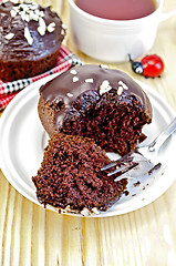 Image showing Cupcake chocolate break up with a fork