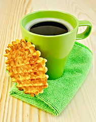 Image showing Waffles circle with a green mug on the board