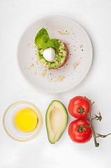 Image showing Tomatoes, avocado and olive oil with salad