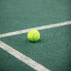 Image showing Tennis ball on a tennis court