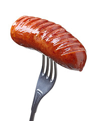 Image showing Grilled smoked sausage on a fork