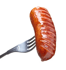 Image showing Grilled smoked sausage on a fork