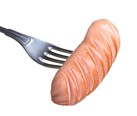 Image showing Grilled sausage on a fork