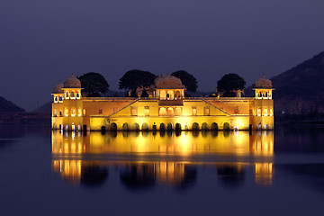 Image showing jal mahal palace on lake at night in India