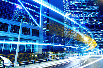 Image showing moving car with blur light through city at night