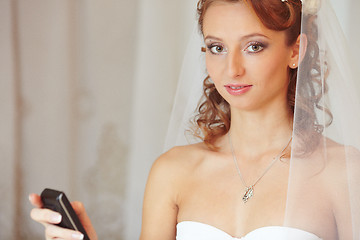 Image showing Bride with the phone