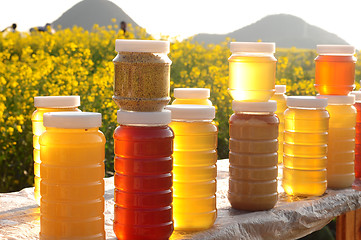 Image showing Bottles of fresh honey