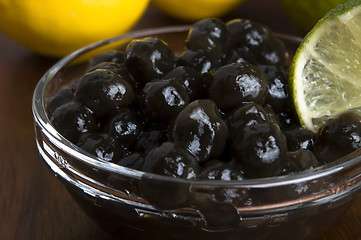 Image showing tapioca pearls with lime. white bubble tea ingredients