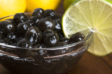 Image showing tapioca pearls with lime. white bubble tea ingredients