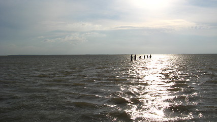 Image showing People bathing in the sea