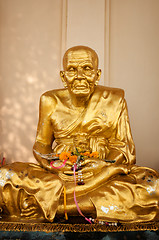 Image showing Gold buddhist monk statue