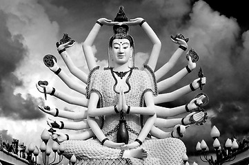 Image showing Eighteen arms Buddha over sky