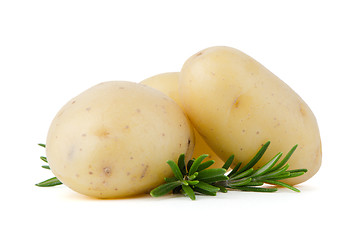 Image showing New potatoes and green herbs