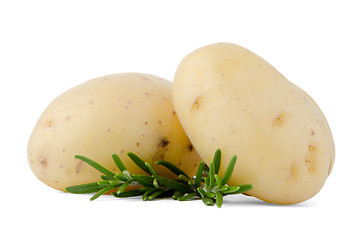 Image showing New potatoes and green herbs