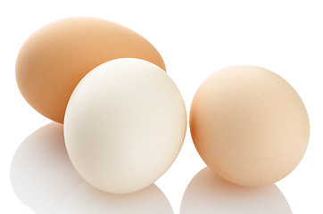 Image showing Three eggs on white 
