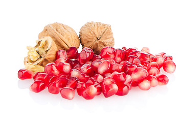 Image showing Pomegranate seed pile and nuts