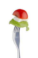 Image showing Caprese salad on the fork