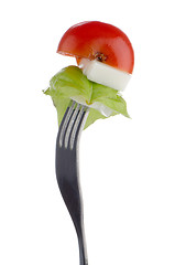 Image showing Caprese salad on the fork