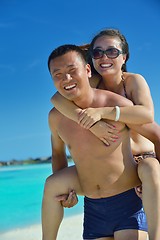 Image showing happy young  couple enjoying summer on beach