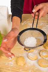 Image showing Icing sugar on cookies