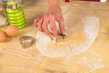 Image showing Cutting out dough