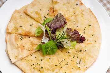 Image showing garlic pita bread pizza with salad on top