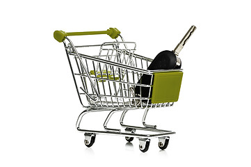 Image showing Car key in a shopping trolley