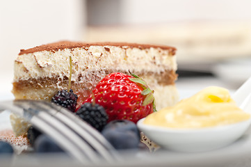 Image showing tiramisu dessert with berries and cream