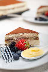 Image showing tiramisu dessert with berries and cream