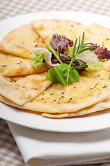 Image showing garlic pita bread pizza with salad on top