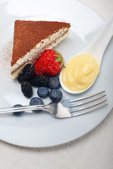 Image showing tiramisu dessert with berries and cream