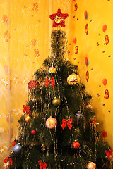 Image showing harmonous and dressed up New Year's fur-tree