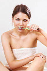 Image showing woman cleans teeth
