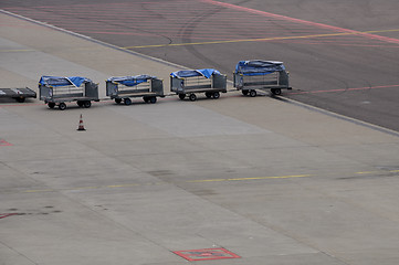 Image showing Empty luggage carts at the airport