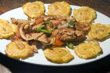 Image showing grilled chicken fajita food with local tostones fried plantains 