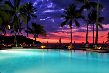 Image showing swimming pool sunset parasol   in nosy be