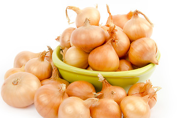 Image showing A bowl full of onions on white background