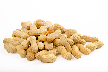 Image showing Many peanuts in shells on a white background
