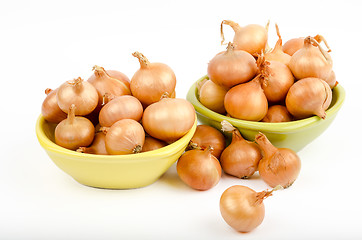 Image showing Two bowls full of onions on a white background