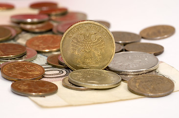 Image showing Coins on the banknote 