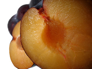 Image showing Halved Black Plums