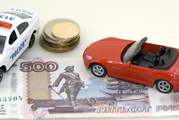 Image showing Red toy car, money and documents