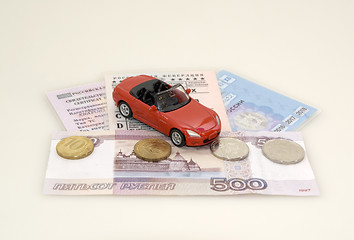 Image showing Toy car, money and documents