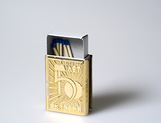 Image showing A box of matches in a special metal cover 