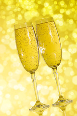 Image showing Champagne  on the yellow background