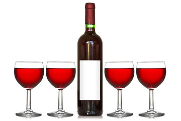 Image showing Four wineglass and wine bottle