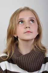 Image showing portrait of a elementary girl looking up