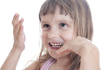 Image showing playful child with wet face